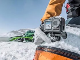 An action shot featuring the Kaiser Baas X450 which is the best budget action camera in a snowy environment, highlighting its ruggedness and capability to record in extreme conditions without the high expense.