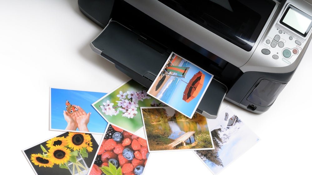 A selection of the best photo printers showcasing various models and brands, each capable of producing beautiful, high-quality photo prints.