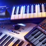 An atmospheric setup showcasing a variety of best MIDI keyboards with illuminated keys, including Arturia and Akai MPK Mini, set against a backdrop of ambient blue lighting, emphasizing the modern musician's studio.
