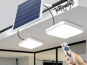 A state-of-the-art TechGadgets solar indoor lighting system installed on a modern facade, with two bright LED panels powered by a large solar panel, controlled by a handheld remote.