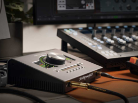 Showcased within a studio setup, the Zoom U-22 is featured as one of the best sound cards for music production, favored for its clarity and reliability.