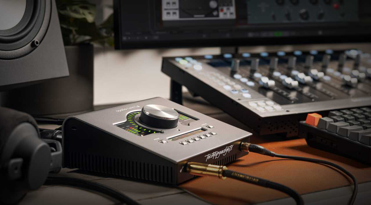 Showcased within a studio setup, the Zoom U-22 is featured as one of the best sound cards for music production, favored for its clarity and reliability.