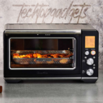 The Breville convection oven, displayed amidst a modern kitchen setting, showcases its capability as the best convection oven for sublimation, perfect for culinary enthusiasts and crafters alike.