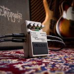 Showcasing the best noise gate pedals, this image captures a BOSS Noise Suppressor NS-2 set up and ready for a performance.
