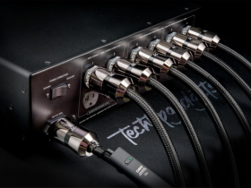 Premium cables connected to the best power conditioner for audio, showcasing advanced power technology for unmatched sound fidelity and protection.