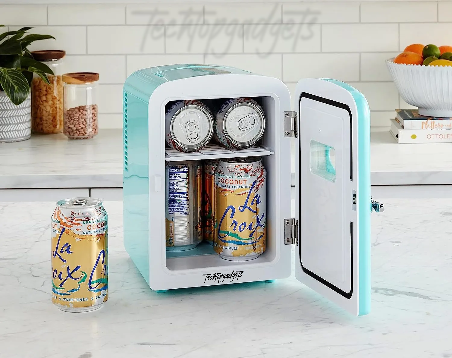 A charming, pastel blue mini fridge, door ajar, displaying an array of LaCroix cans, offers the best freezerless experience for keeping drinks chilled on a kitchen countertop.