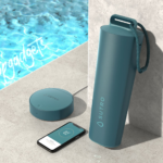 The Sutro smart pool monitor system, resting poolside with its charging base, pairs effortlessly with a smartphone app to ensure your pool remains in pristine condition.