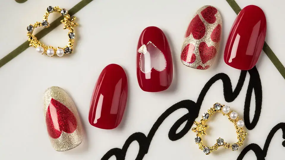 A range of nail designs showcasing the versatility of printing photos on nails, from classic red to sparkling gold accents, aligned with elegant jewelry on a stylish background.