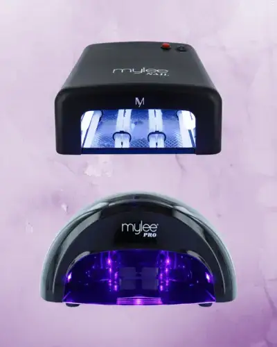 A black LED nail dryer with an illuminated interior, ideal for setting and curing gel nail polishes quickly and professionally at home or in salons.