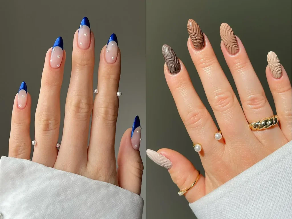 Two hands sporting different textured nail art designs, representing the advanced capabilities and troubleshooting solutions for a nail art design printer.